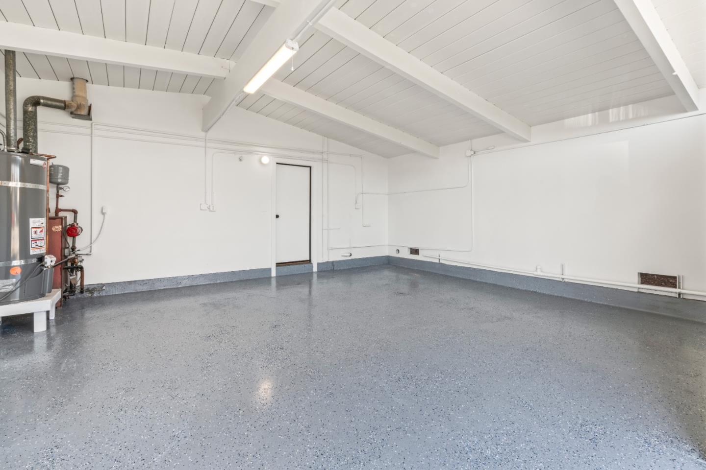 1714 Celeste Drive San Mateo, CA 94402 - Photo 43 of 45 an empty room with air conditioner and windows