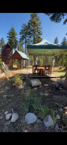 a view of a backyard of the house