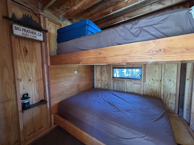a bathroom with a mirror and a shower