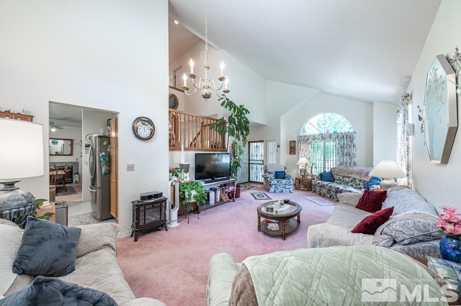 3930 Aspendale Drive Reno, NV 89503 - Photo 9 of 26 a living room with furniture and a flat screen tv