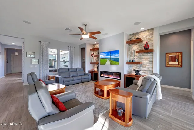 a living room with furniture and a window