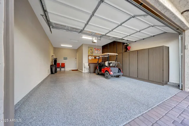 a view of a park with trees in the background