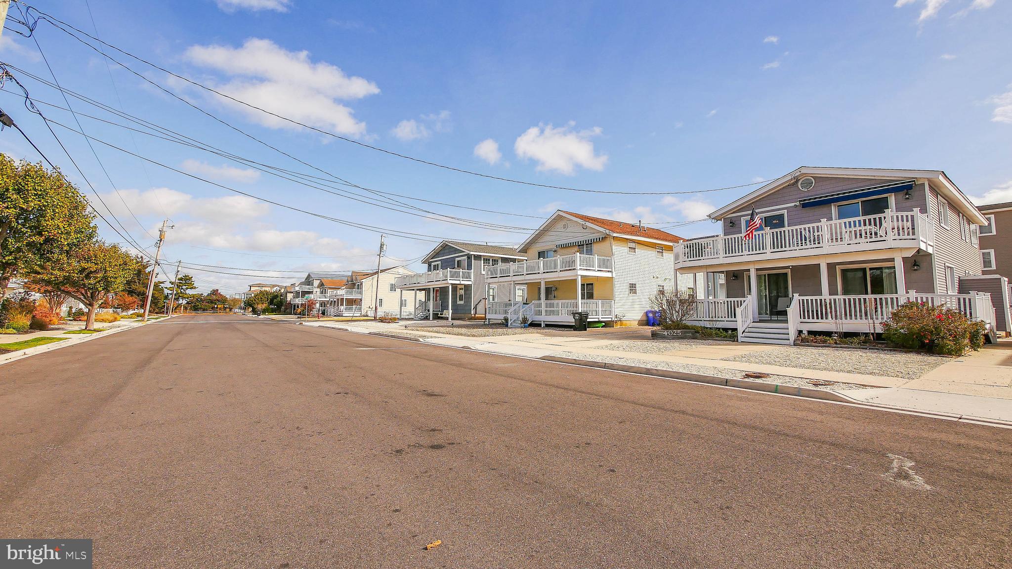 4025 4th Avenue Avalon, NJ 08202 - Photo 2 of 32 a view of a city street both side of house