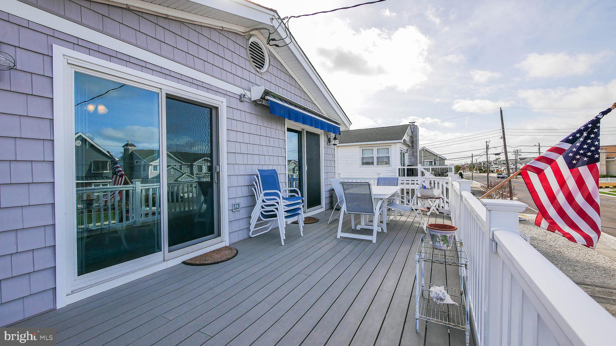 4025 4th Avenue Avalon, NJ 08202 - Photo 26 of 32 a view of deck with patio
