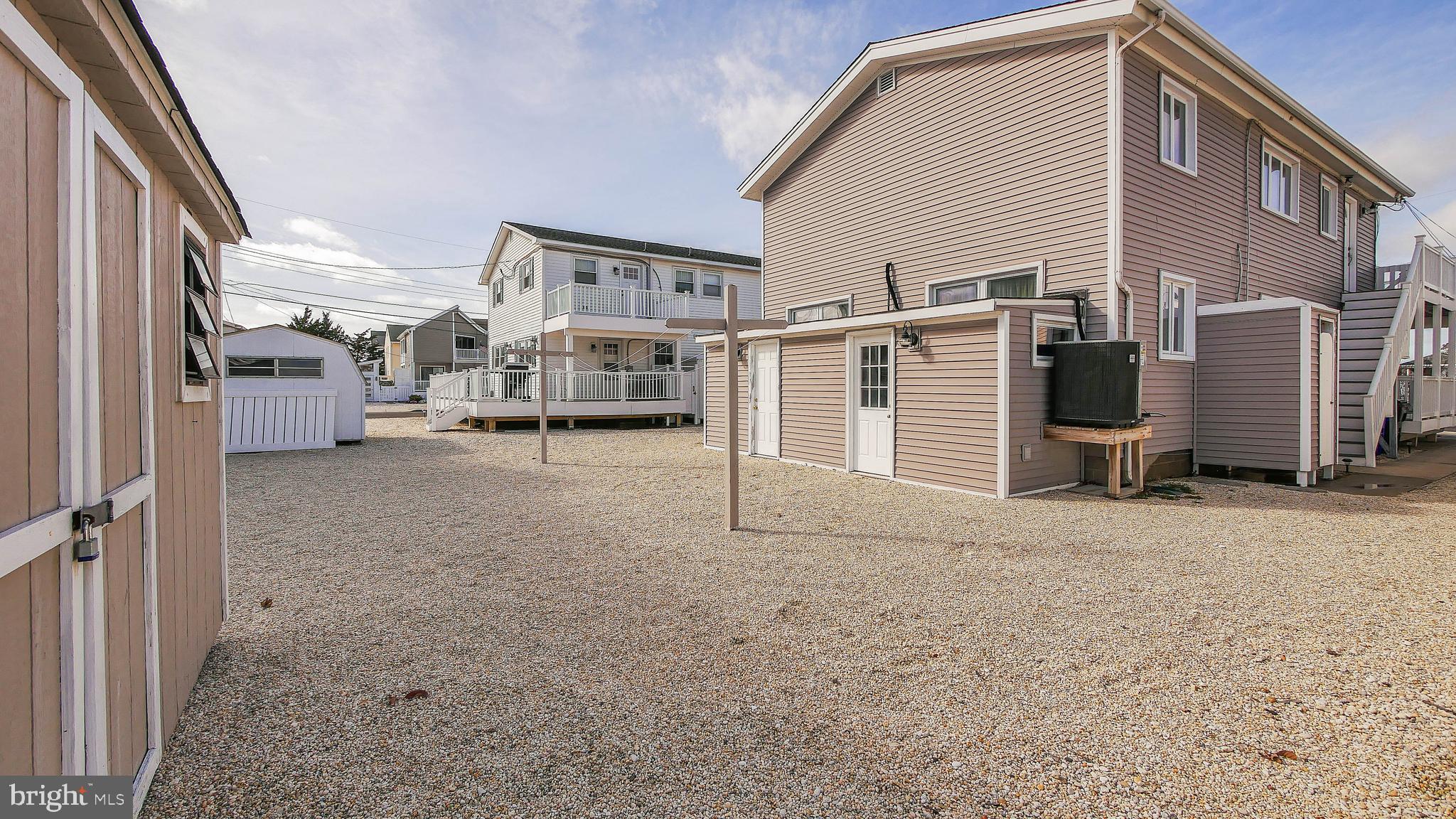 4025 4th Avenue Avalon, NJ 08202 - Photo 7 of 32 a view of a house with a patio