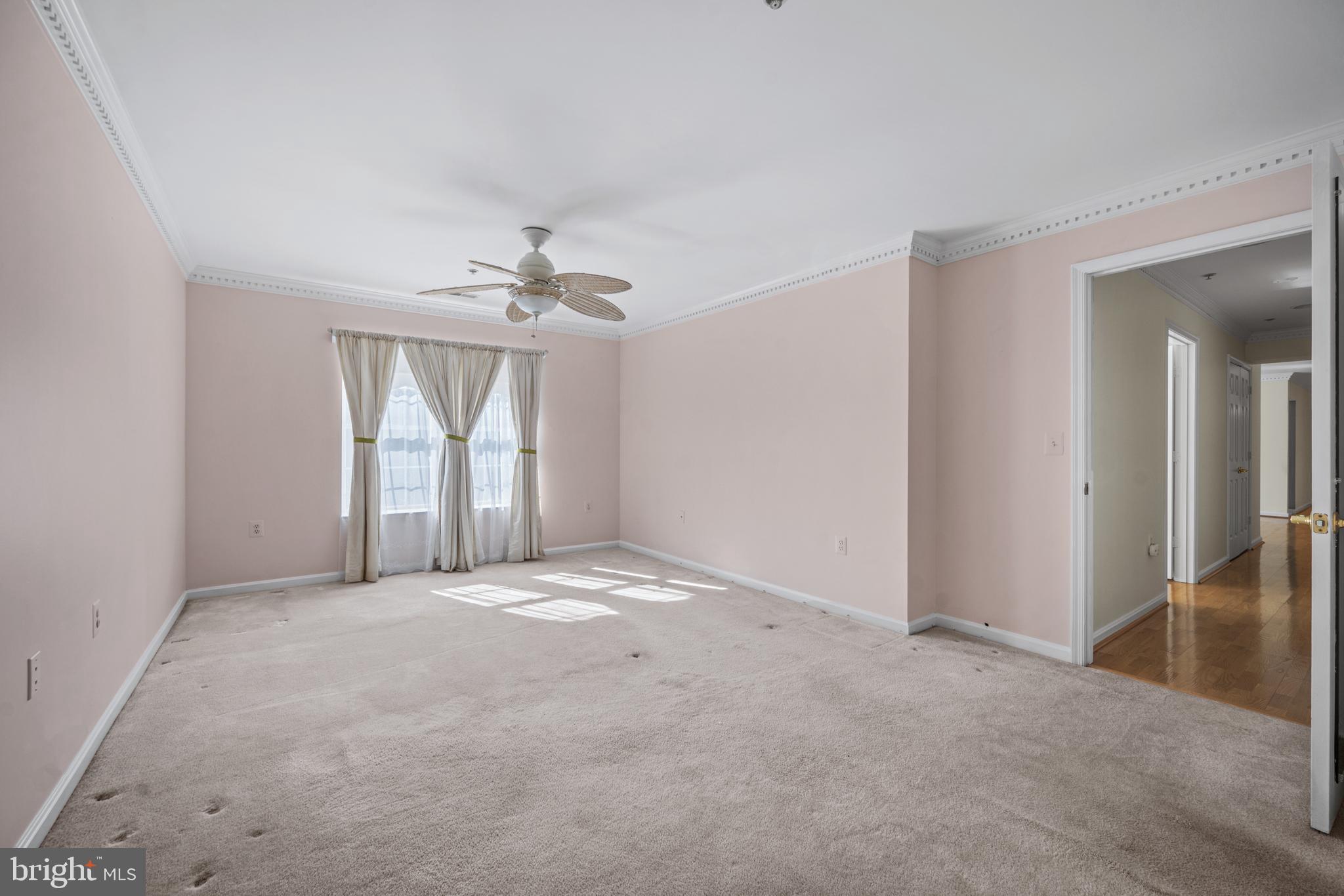 12021 Tralee Road, Unit 401 Lutherville-Timonium, MD 21093 - Photo 27 of 36 Primary Bedroom