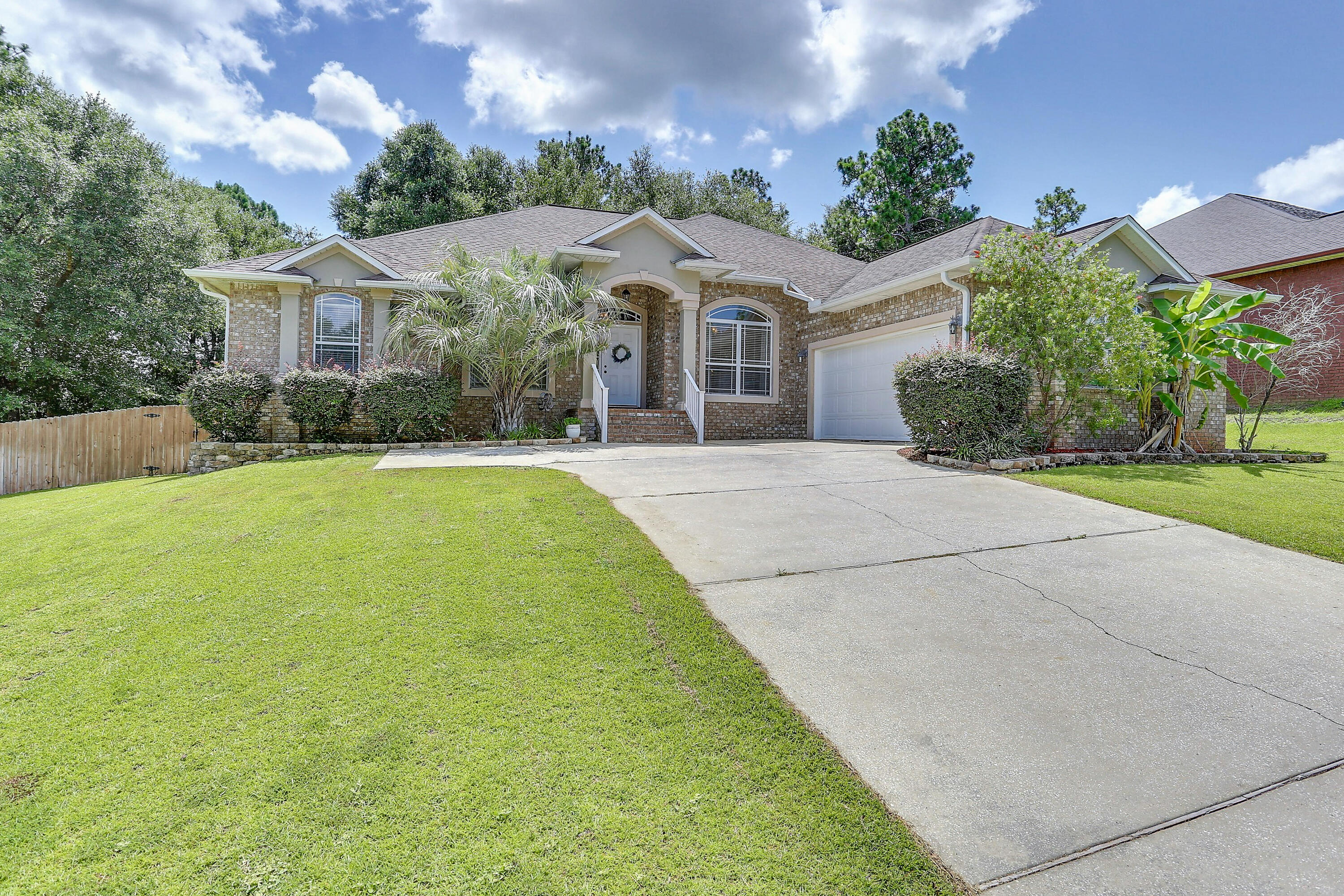 202 Pinque Coat Court Crestview, FL 32536 - Photo 2 of 35 a front view of house with yard and green space