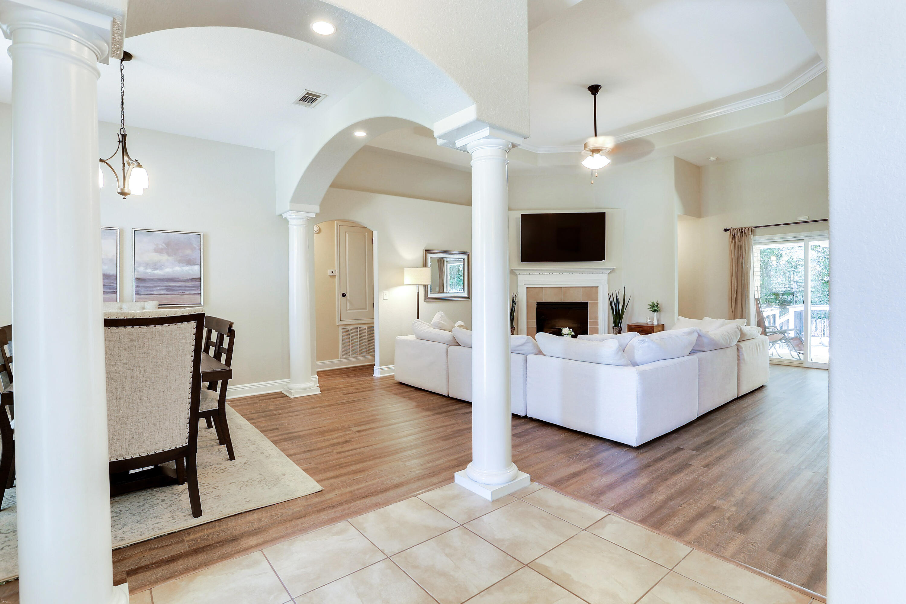 202 Pinque Coat Court Crestview, FL 32536 - Photo 11 of 35 a living room with furniture and a flat screen tv