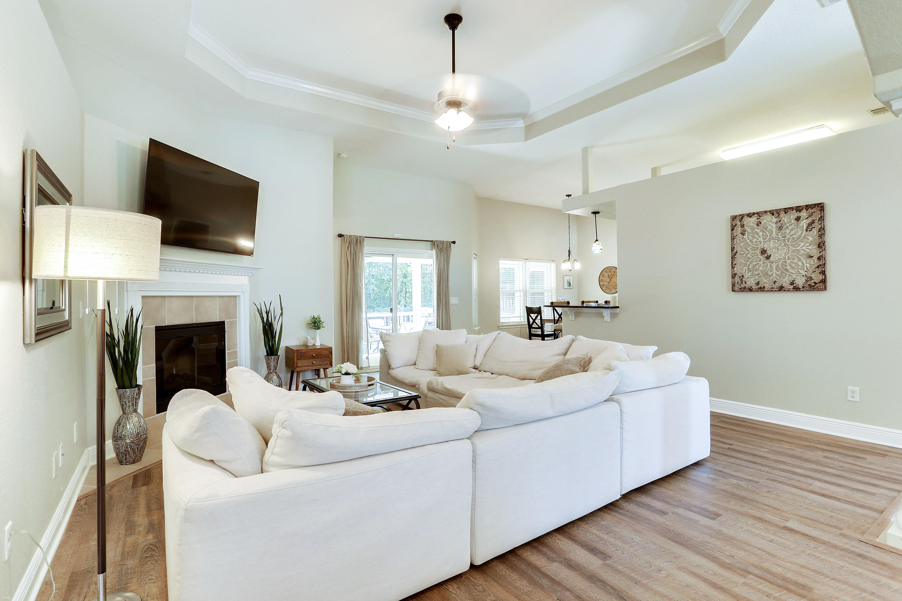 202 Pinque Coat Court Crestview, FL 32536 - Photo 12 of 35 a living room with furniture fireplace and flat screen tv
