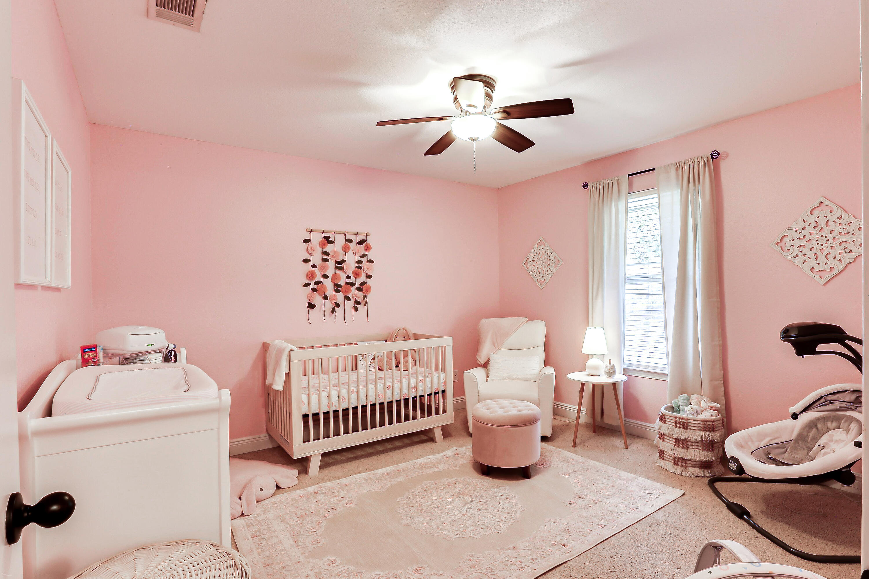 202 Pinque Coat Court Crestview, FL 32536 - Photo 14 of 35 a bedroom with furniture and a window