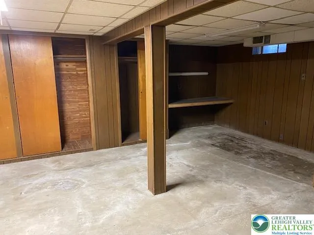 a view of room with a flat screen tv