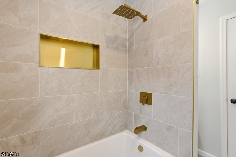 510 Davsel Road Landing, NJ 07850 - Photo 17 of 25 a bathroom with a bathtub and a shower