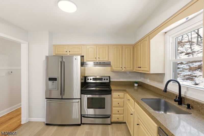 510 Davsel Road Landing, NJ 07850 - Photo 20 of 25 a kitchen with appliances a sink and a window