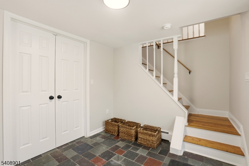510 Davsel Road Landing, NJ 07850 - Photo 4 of 25 a view of entryway with stairs and a rug