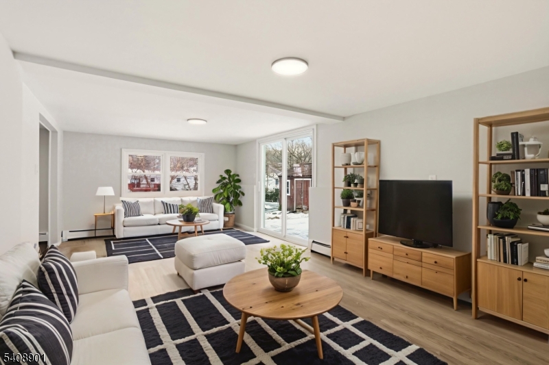 510 Davsel Road Landing, NJ 07850 - Photo 5 of 25 a living room with furniture and a flat screen tv