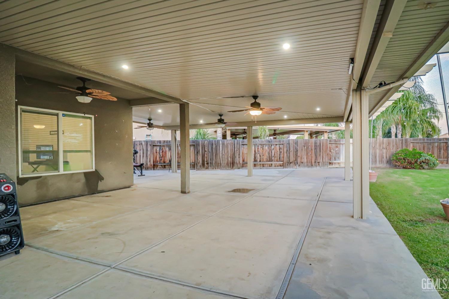 Undisclosed Address Bakersfield, CA 93313 - Photo 21 of 25 a swimming pool with a outdoor seating and yard
