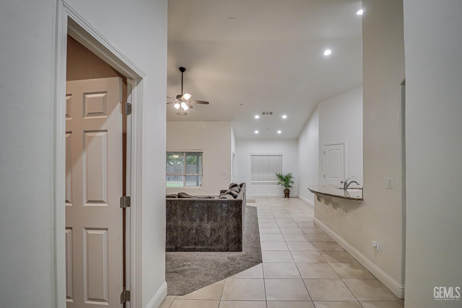 Undisclosed Address Bakersfield, CA 93313 - Photo 5 of 25 a large bathroom with a sink a mirror and a shower