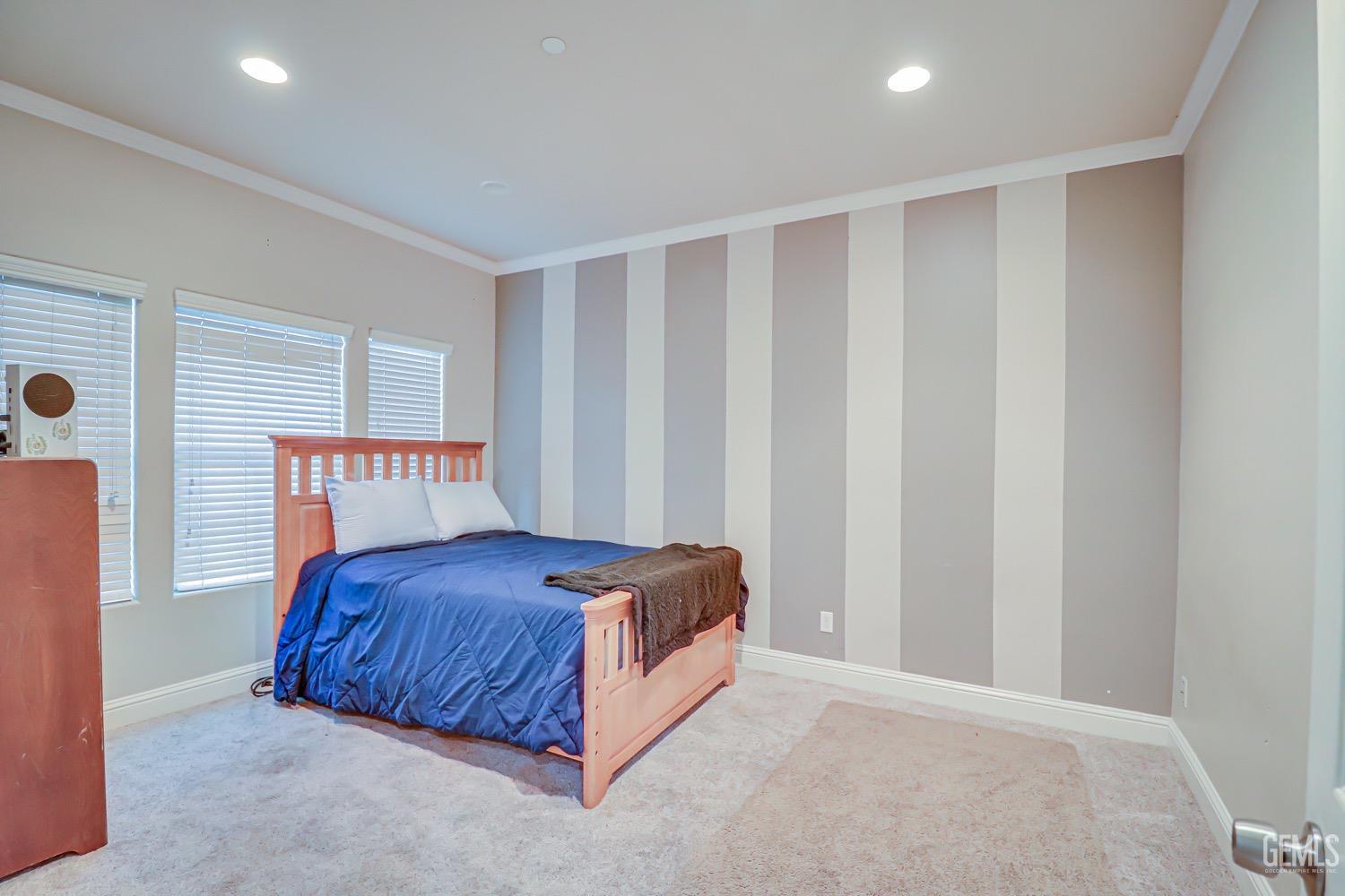 Undisclosed Address Bakersfield, CA 93313 - Photo 6 of 25 a bedroom with a bed and a window