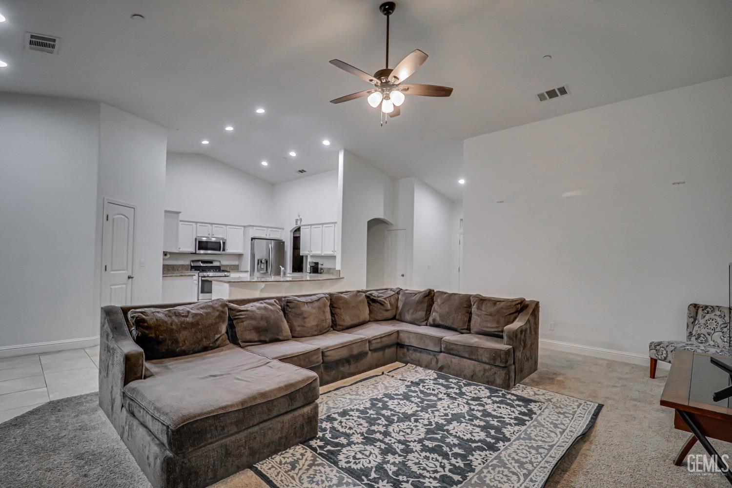 Undisclosed Address Bakersfield, CA 93313 - Photo 9 of 25 a living room with furniture and a rug