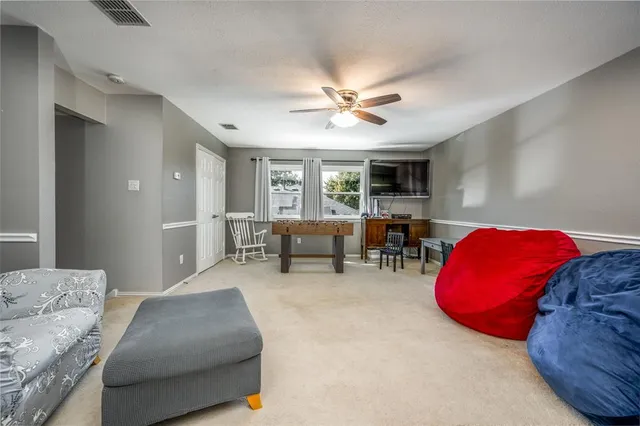 a view of a hallway with washer and dryer