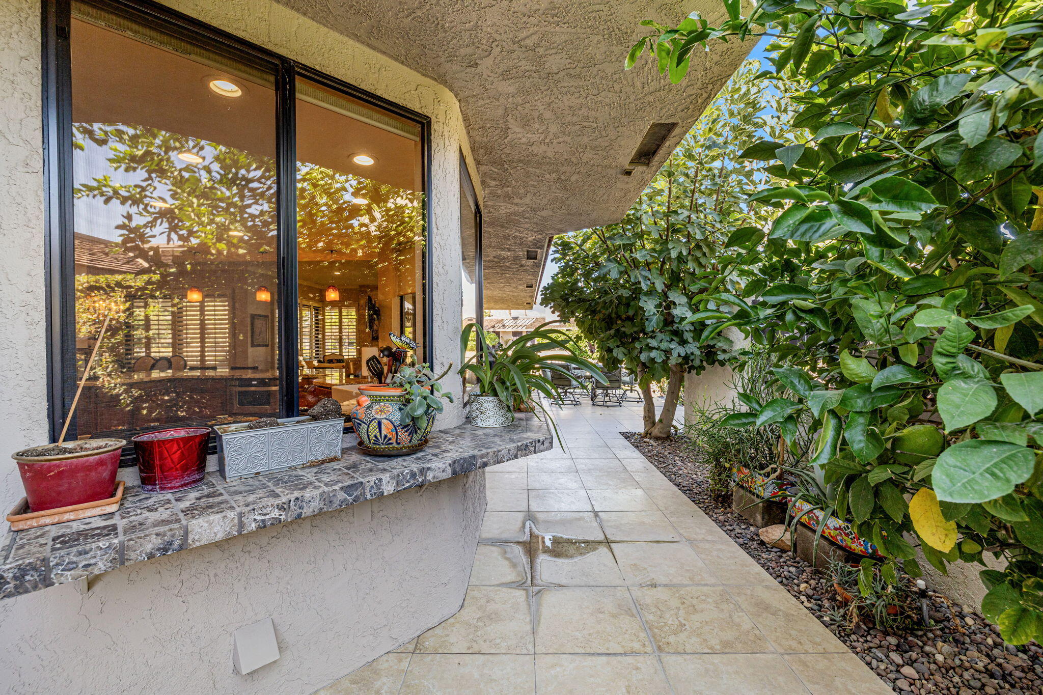 10 Whittier Court Rancho Mirage, CA 92270 - Photo 22 of 88 a lobby with furniture and floor to ceiling window