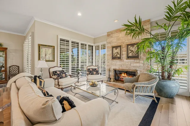 a bathroom with a sink a vanity and a shower