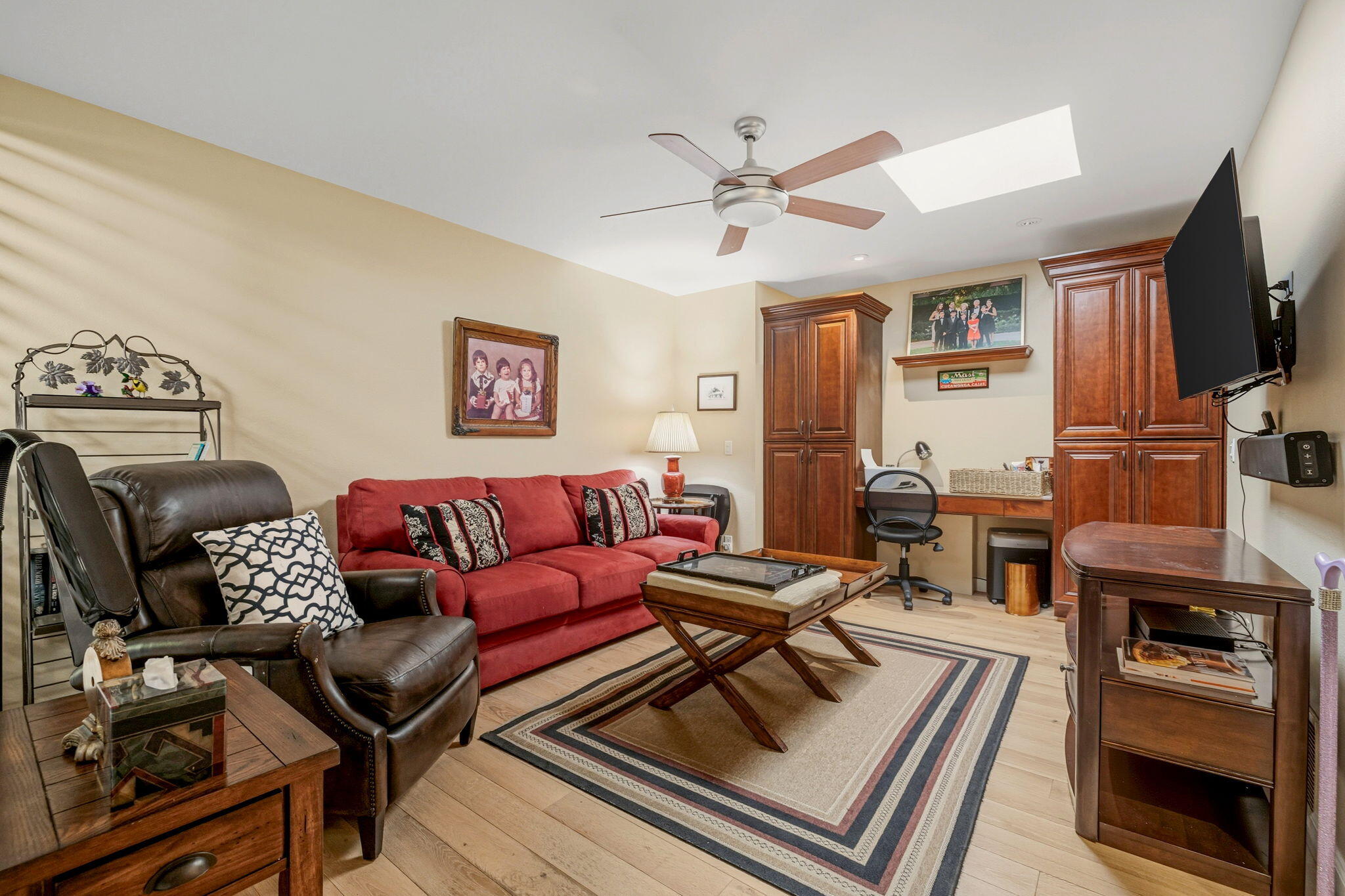 10 Whittier Court Rancho Mirage, CA 92270 - Photo 53 of 88 a living room with furniture and a flat screen tv