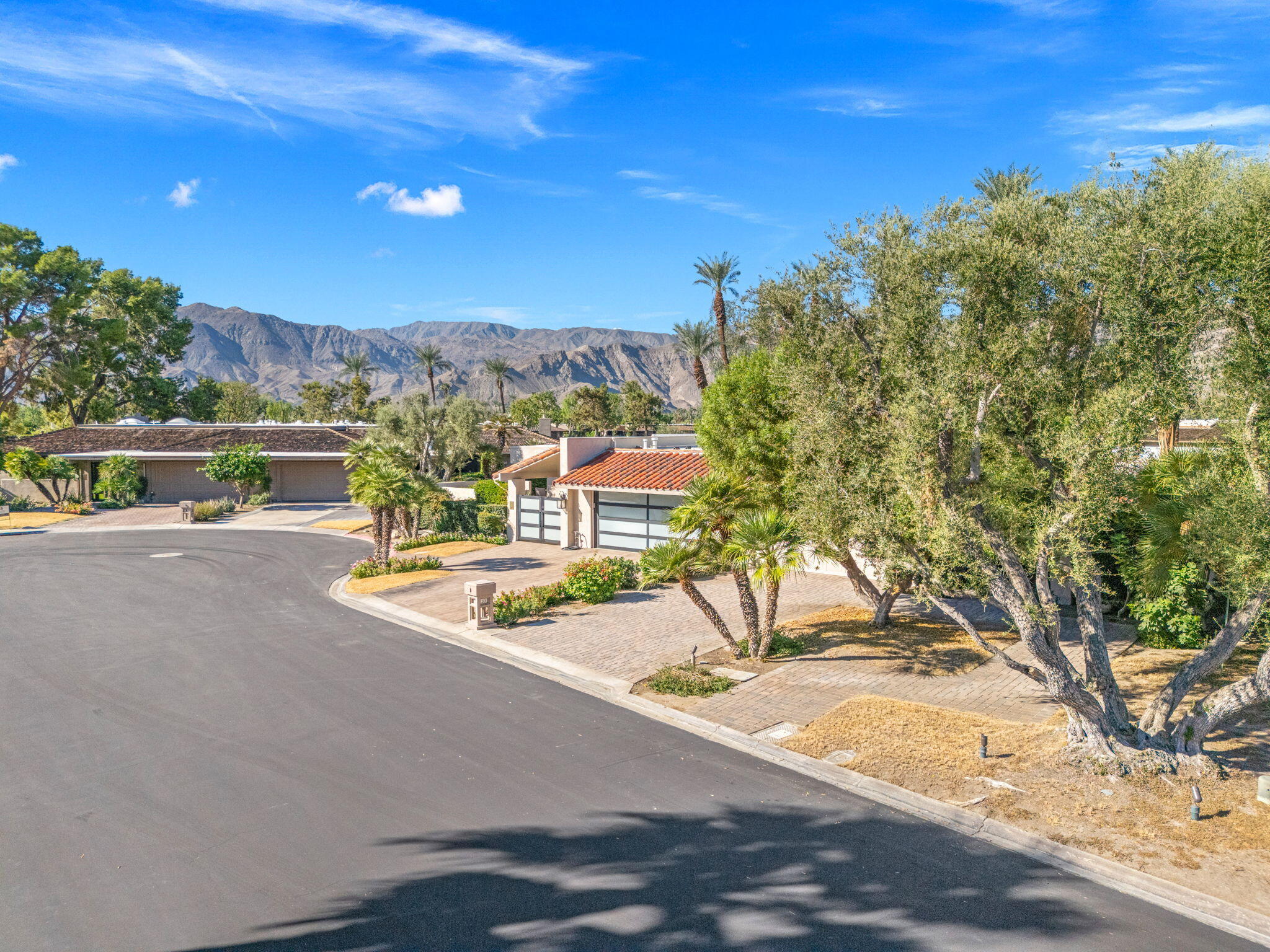 10 Whittier Court Rancho Mirage, CA 92270 - Photo 7 of 88 a view of a street with a building in the background