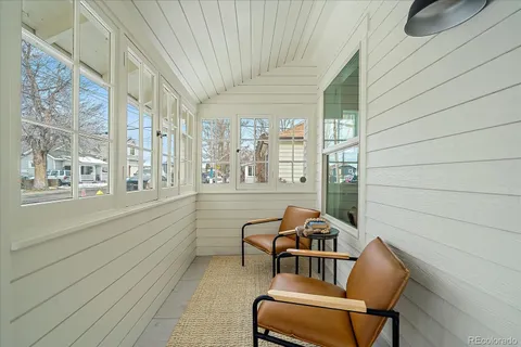 a balcony with outdoor seating