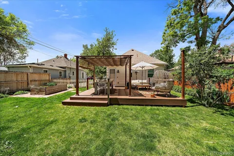an aerial view of a house with outdoor space