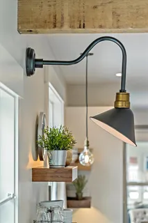 a vase of flowers sitting on a table