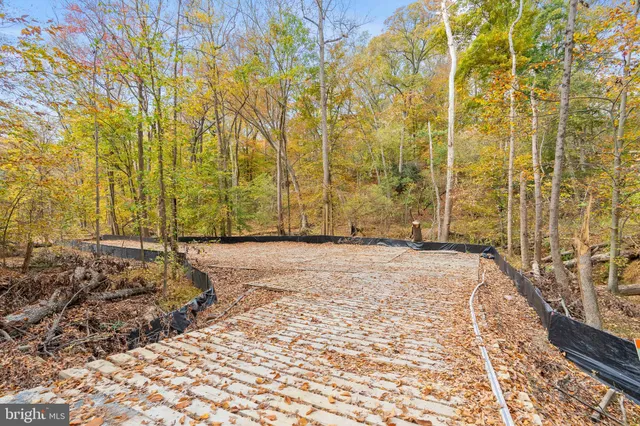 a view of a backyard of the house