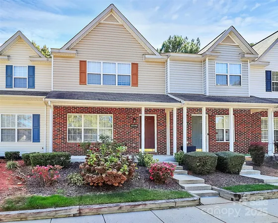 front view of a house and a yard