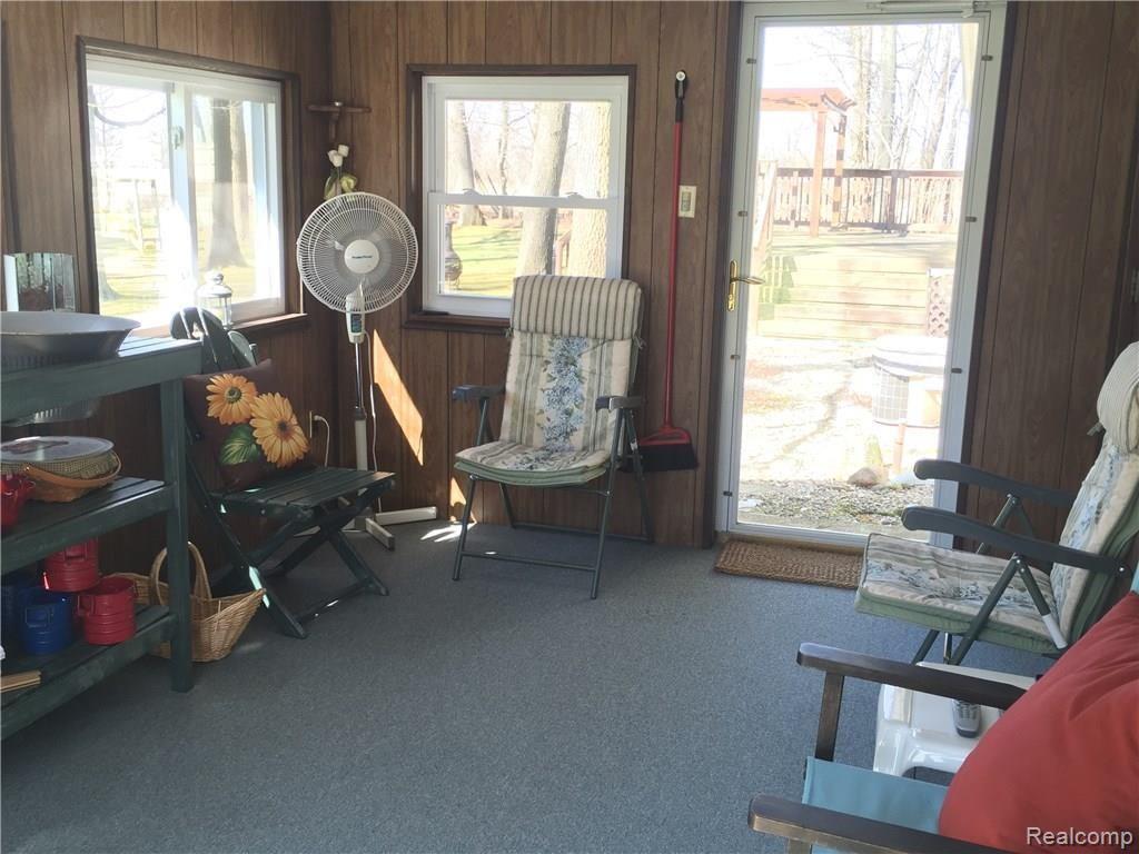 10735 Roberts Road Stockbridge, MI 49285 - Photo 20 of 34 Sun room! South side of home!