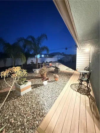 a view of swimming pool with a patio