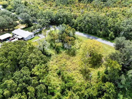 a view of a lake with a house