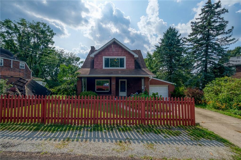 120 Duffield Avenue Pittsburgh, PA 15235 - Photo 2 of 21 a front view of a house with a garden