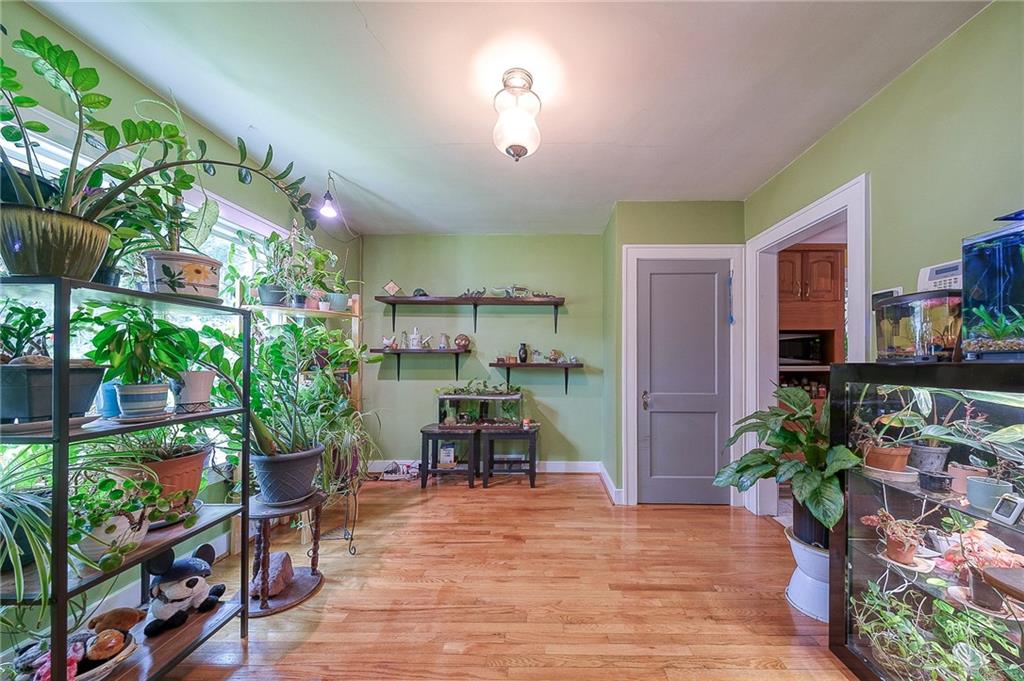 120 Duffield Avenue Pittsburgh, PA 15235 - Photo 6 of 21 a view of a dining room with furniture window and wooden floor
