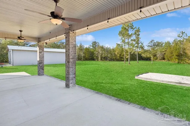 a view of a backyard with a garden
