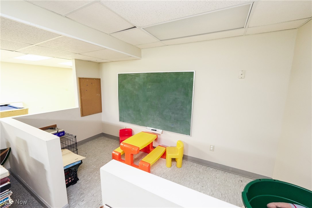 817 Rickel Circle Akron, OH 44333 - Photo 38 of 49 Playroom featuring a paneled ceiling and baseboards