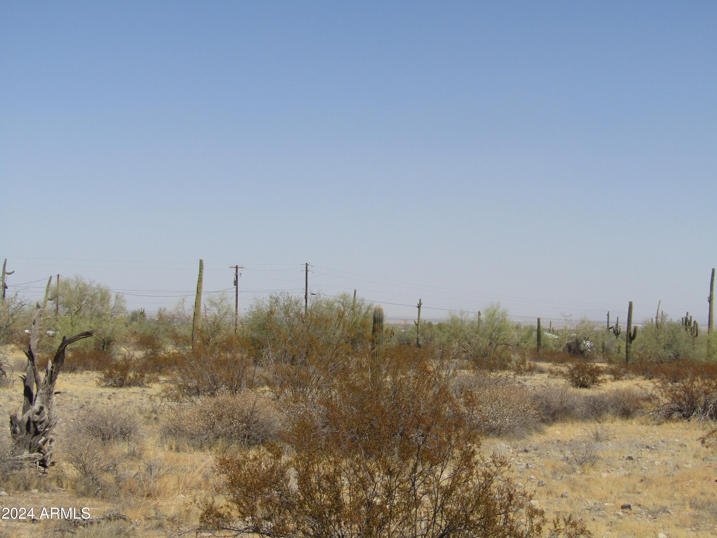 0 West Momoli Road, Unit 24 Maricopa, AZ 85139 - Photo 4 of 11 a view of a city with lots of trees