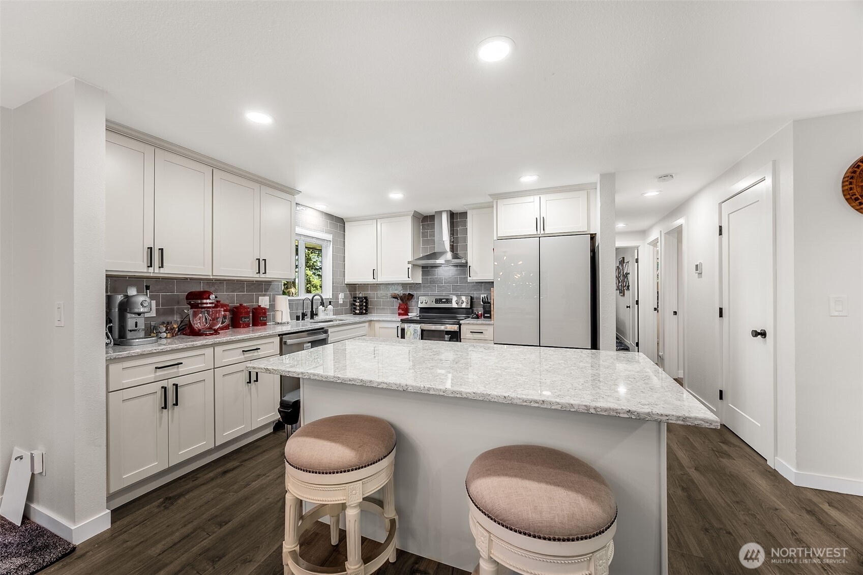 24028 6th Place West Bothell, WA 98021 - Photo 14 of 35 a large kitchen with a table and chairs