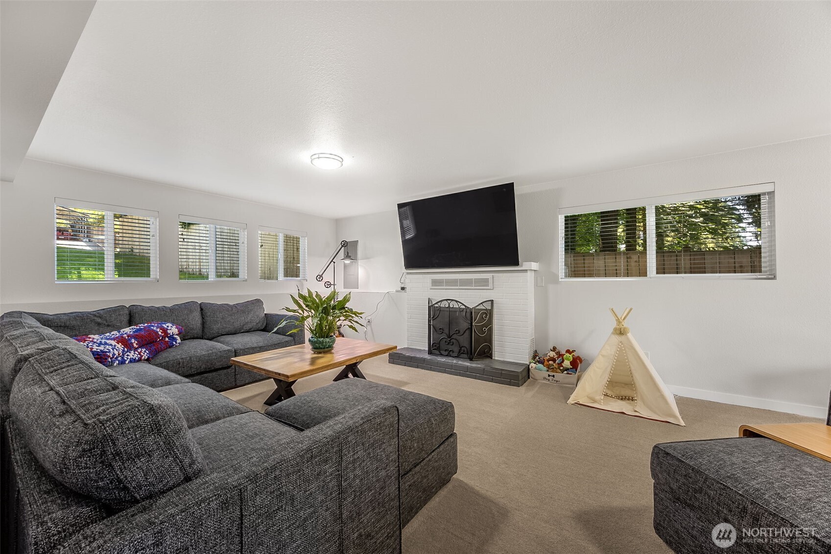 24028 6th Place West Bothell, WA 98021 - Photo 16 of 35 a living room with furniture and a flat screen tv