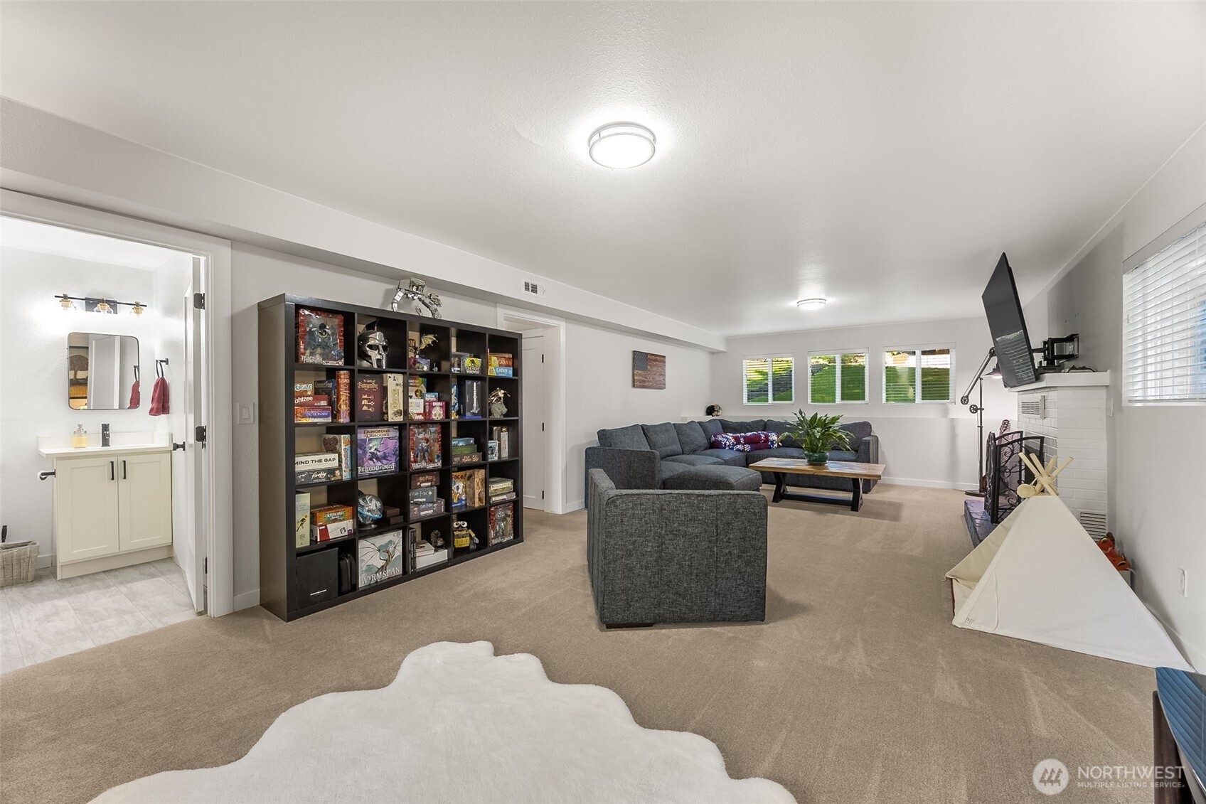 24028 6th Place West Bothell, WA 98021 - Photo 18 of 35 a living room with furniture and a book shelf