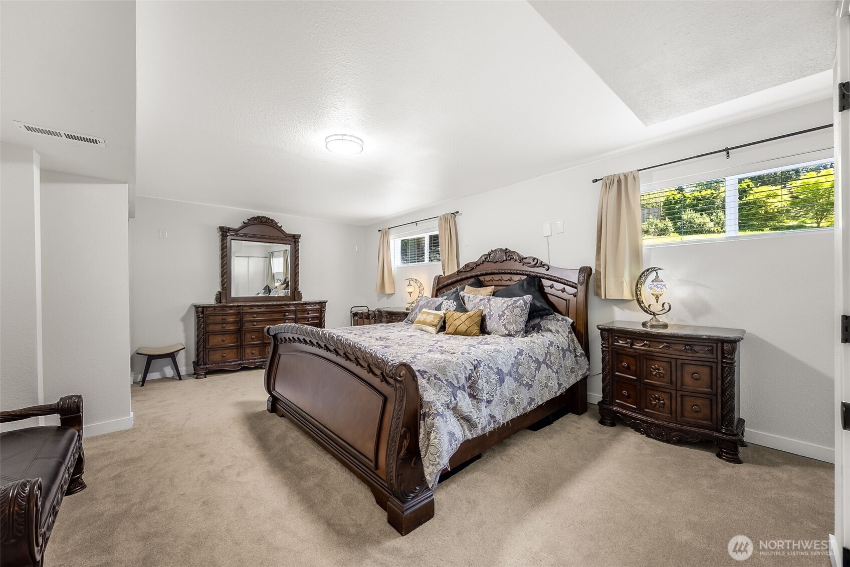 24028 6th Place West Bothell, WA 98021 - Photo 20 of 35 a bedroom with a bed and a couch