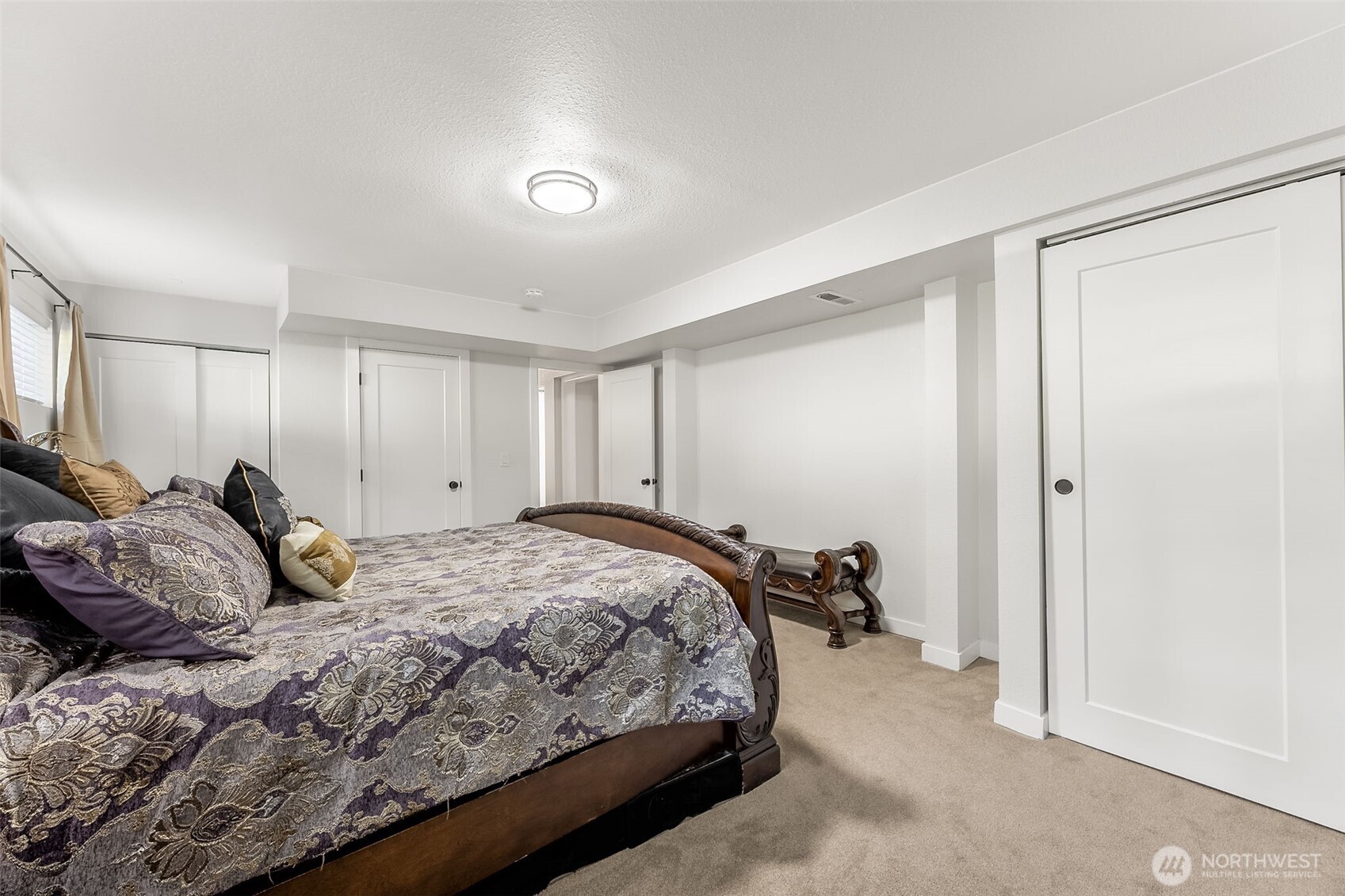 24028 6th Place West Bothell, WA 98021 - Photo 21 of 35 a bedroom with a bed and a window