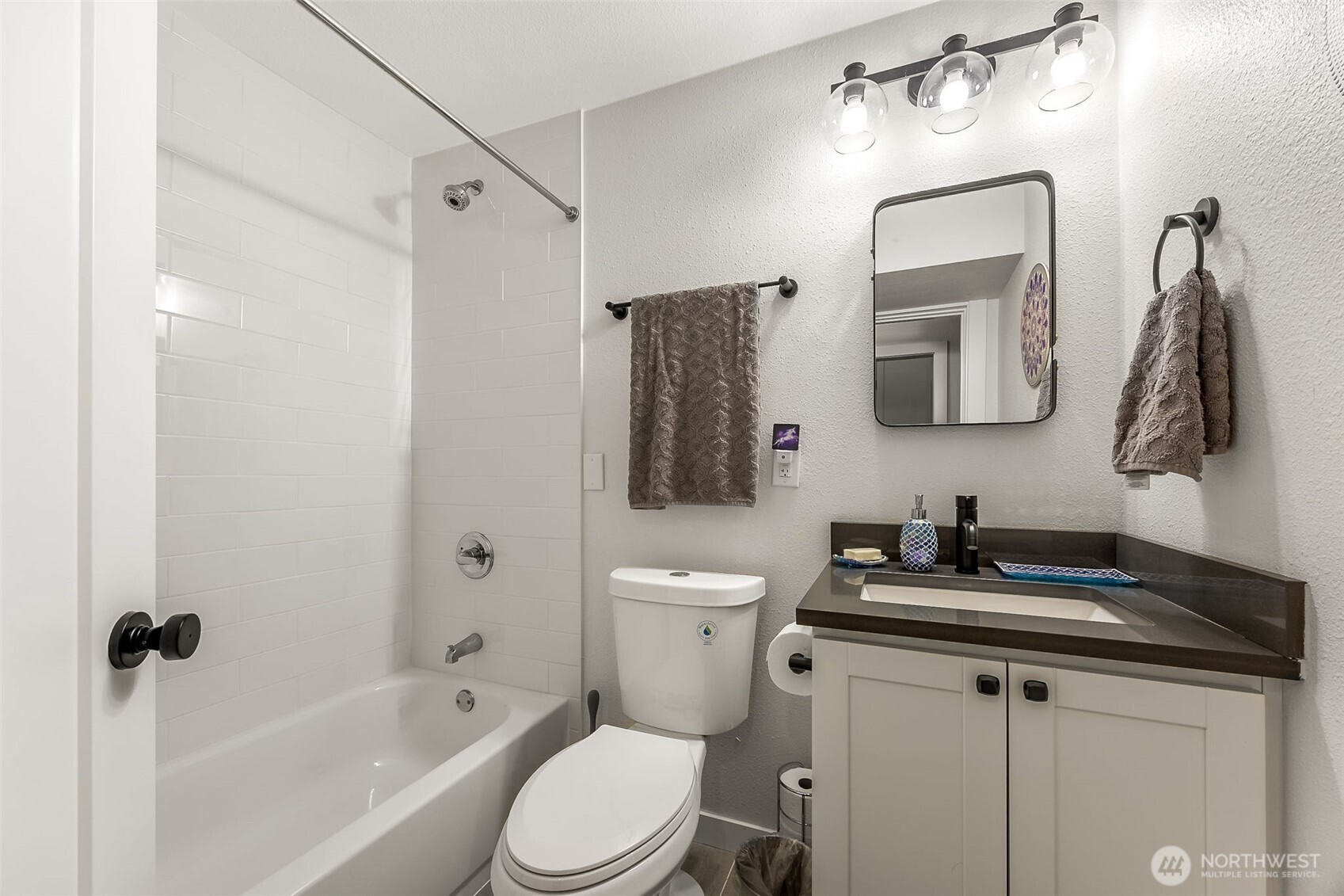 24028 6th Place West Bothell, WA 98021 - Photo 27 of 35 a bathroom with a toilet sink vanity tub and mirror