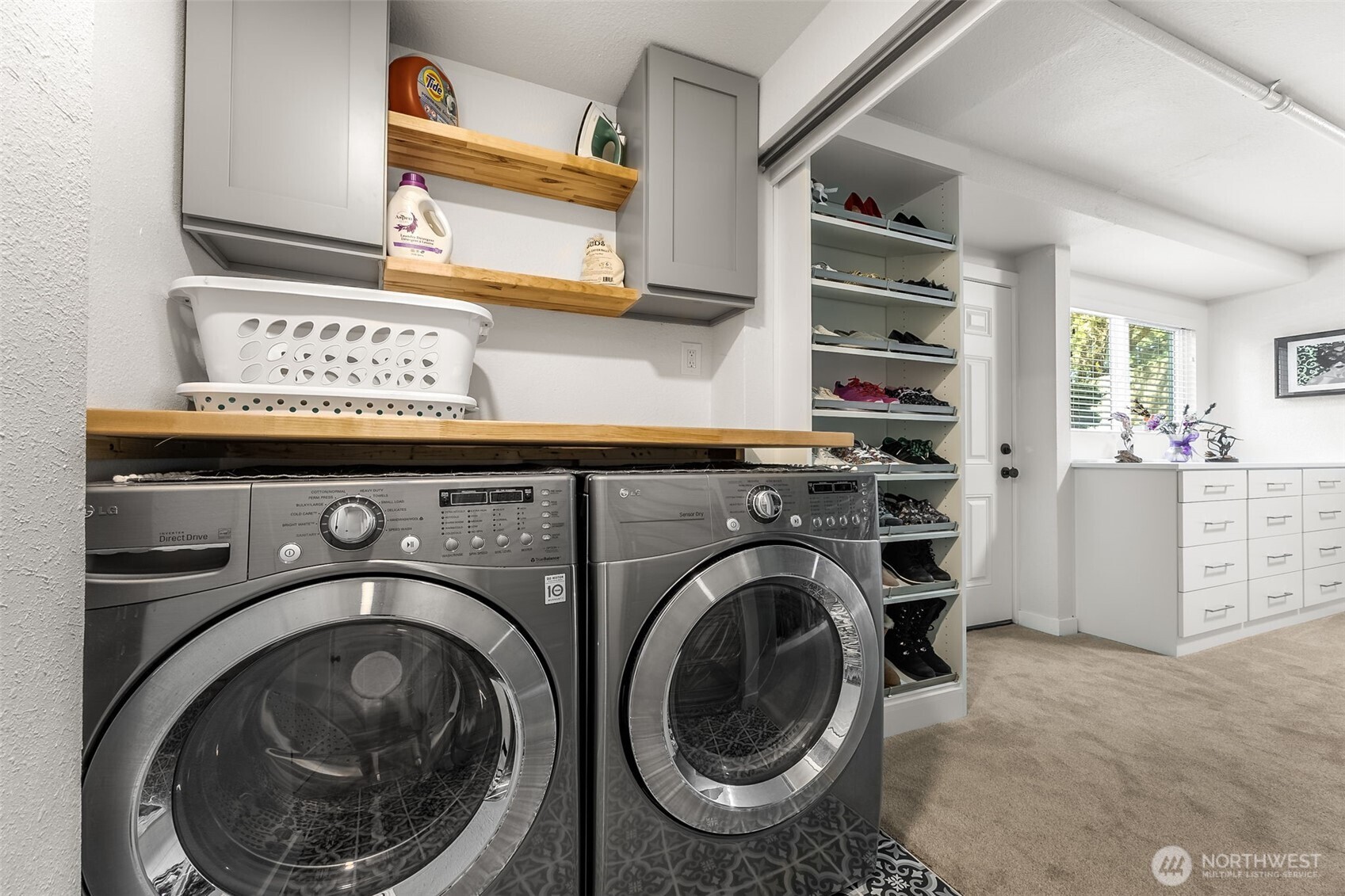 24028 6th Place West Bothell, WA 98021 - Photo 29 of 35 a view of a storage & utility room with washer and dryer