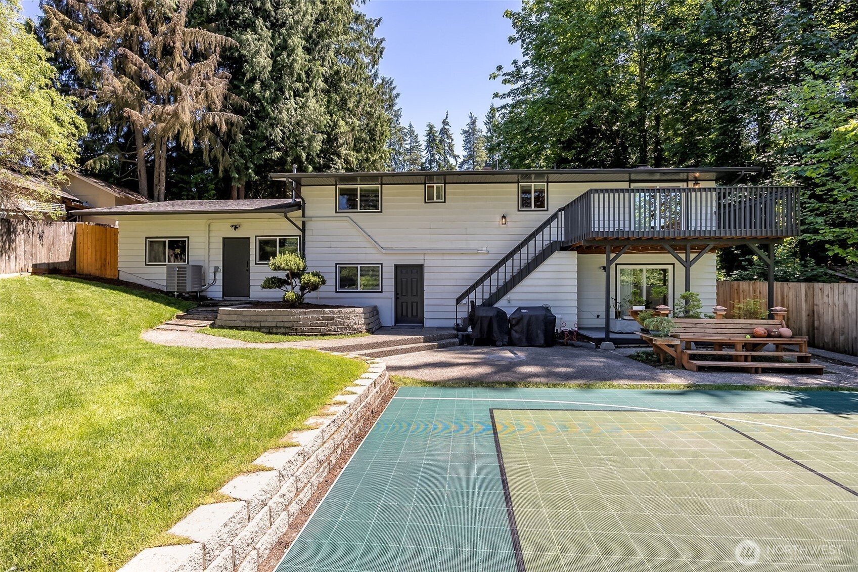 24028 6th Place West Bothell, WA 98021 - Photo 31 of 35 a view of a house with swimming pool and sitting area