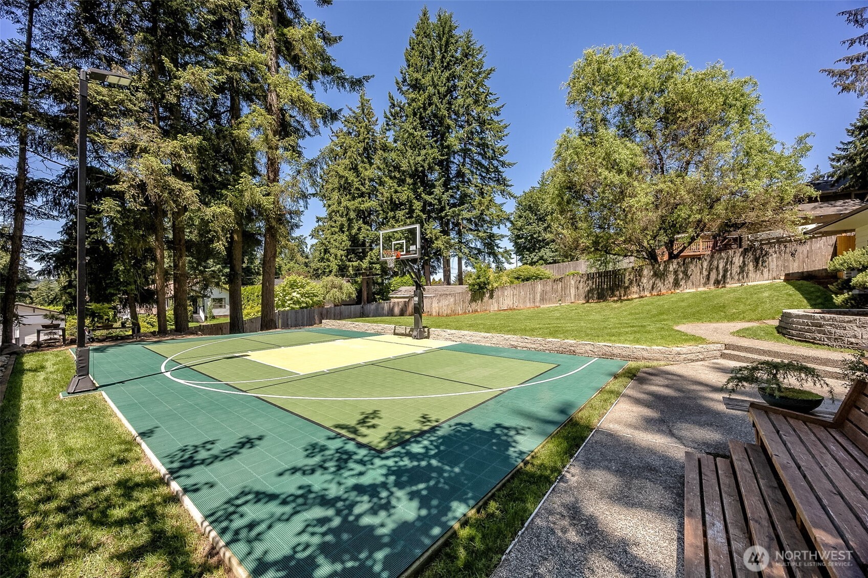 24028 6th Place West Bothell, WA 98021 - Photo 4 of 35 a view of a playground with basketball court